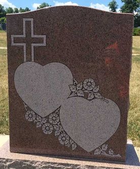Granite monument with heart etching at brookside cemetery in Engelwood NJ