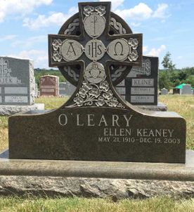 custom cross shaped gravestone at Christ the King Cemetery in Franklin Lakes NJ